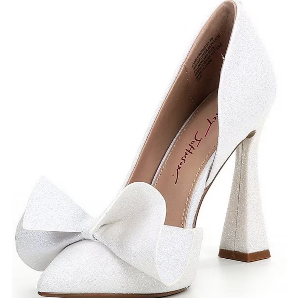 Betsey Johnson’s Nobble Bow Glitter Pointed Toe Pumps in Ivory.
